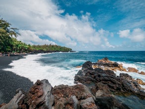 Swim at Kehena Black Sand Beach