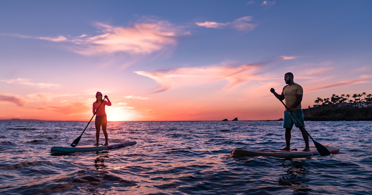Sunset paddle boarding in Fisherman's Cove