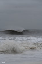 Preparing to Surf in Frigid Waters 