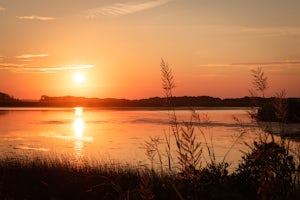 Catch Sunset on the Wild Shores of Back Bay National Wildlife Refuge