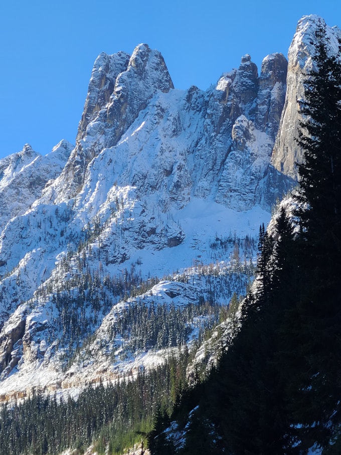 Tall, skinny mountain peaks covered in snow.