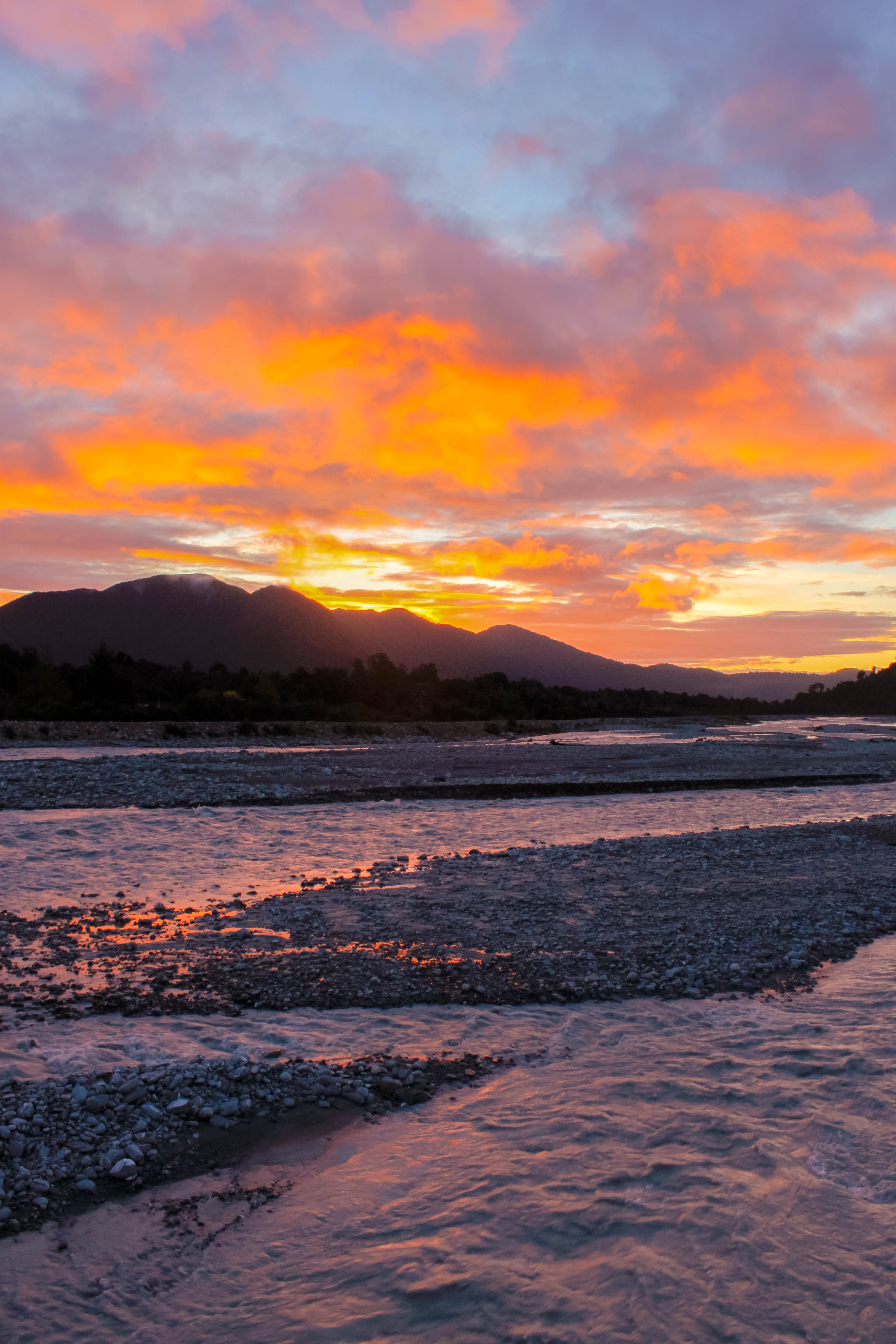 Watch the Sunset from the Waiho River Bridge