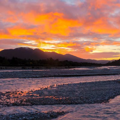 Watch the Sunset from the Waiho River Bridge
