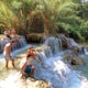Swim in the Kuang Si Waterfall