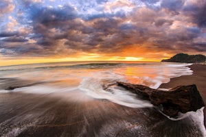 Catch Waves and a Sunset at Playa Jacó