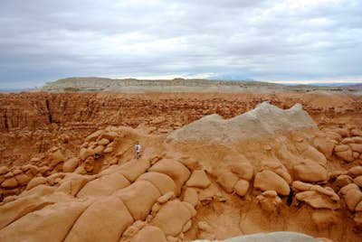 Hike and climb sandstone structures in Goblin Valley for 360 views of Utah
