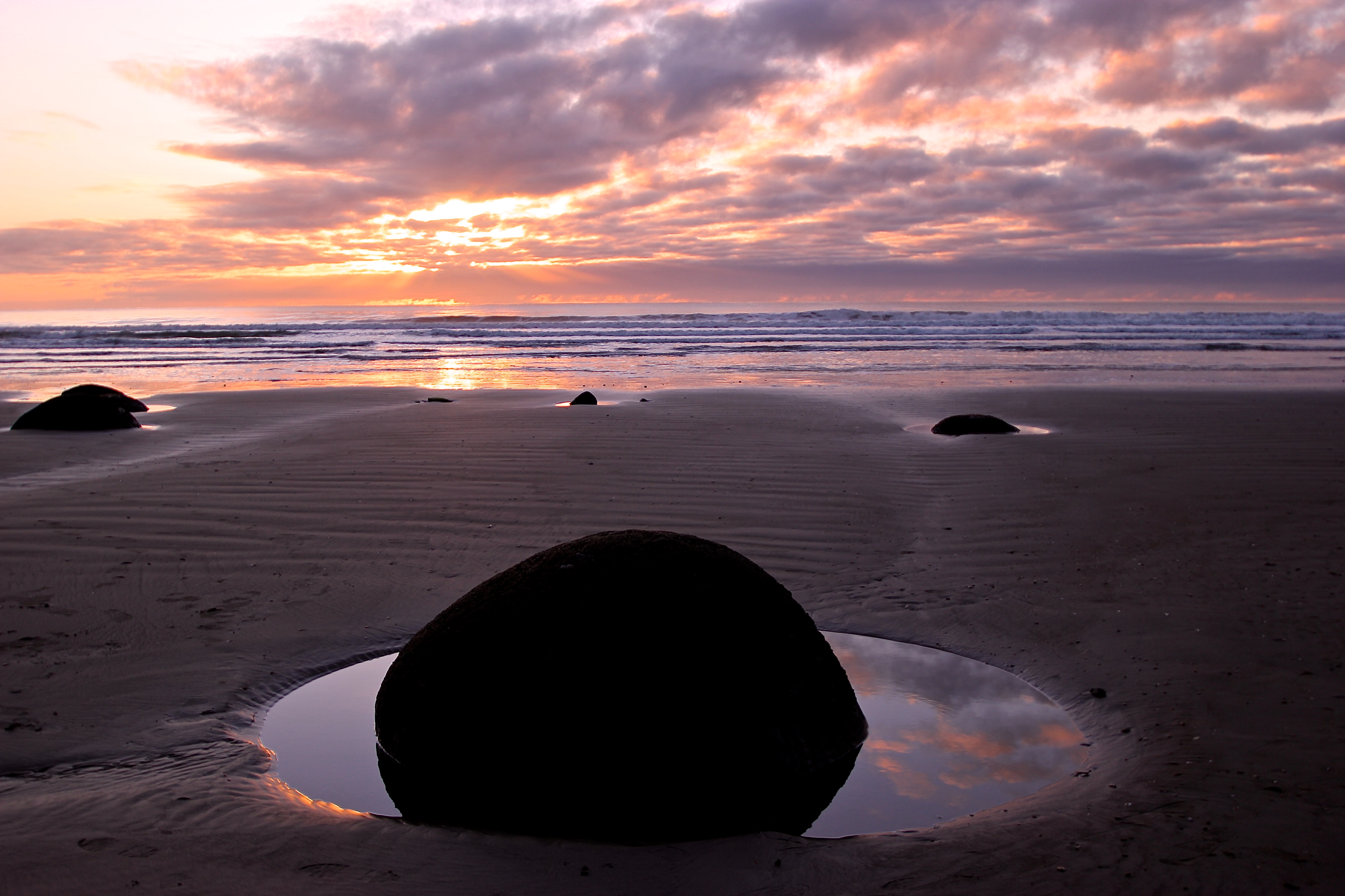 Explore the Moeraki Boulders 