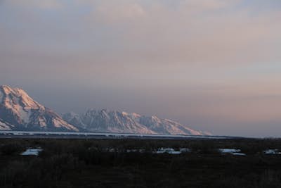 Watch the Sunrise Against the Grand Teton Mountains