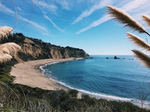 Hike around Greyhound Beach and Climb Greyhound Rock