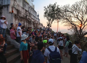 Watch the Sunset from Wat Tham Phousi Temple