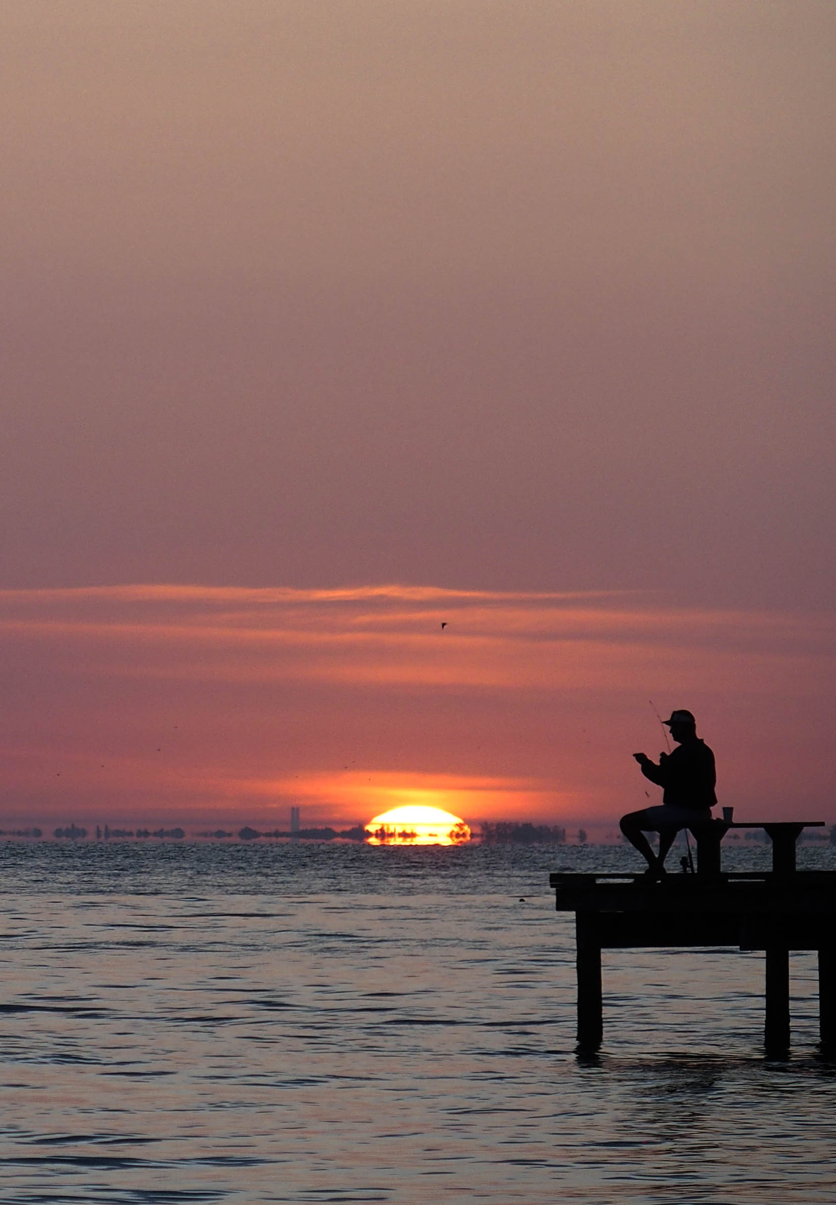 Catch the Sunrise at Rod & Reel Pier