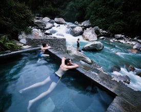 Soak in Jhinu Hot Spring in the Modi Khola Valley